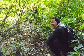 American Film star Terrence Howard tracks chimpanzees in kibale